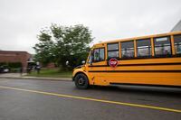 A school bus arrives at Patrick Fogarty High School in Orillia, Ont. on Sept 10 2020. Today marked the return of students to the school, with only grade 9 students attending today. Some students were bussed in from around the school district. Rural area schools face obstacles that arenÕt as much an issue in larger urban centres. 