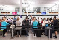 Travellers wait in line at a Sunwing Airlines check-in desk at Trudeau Airport in Montreal, Wednesday, April 20, 2022. Sunwing has issued an apology to passengers left stranded after winter storms upended operations but says “most of our customers enjoyed their holidays with minimal disruption.” THE CANADIAN PRESS/Graham Hughes