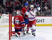 New York Rangers forward Chris Kreider reacts after a teammate scored a goal against Montreal Canadiens goalie Carey Price during the third period at the Bell Centre on Thursday in Montreal.