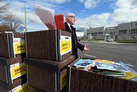 Alex Neve, Secretary General of Amnesty International Canada, holds up some of the 31,000 letters as they call on Saudi Arabia to free Raif Badawi as protesters take part in a rally outside the Embassy of Saudi Arabia in Ottawa on Monday, November 2, 2015. A prominent human rights organization says Canada is failing to bring suspected war criminals to justice. THE CANADIAN PRESS/Sean Kilpatrick
