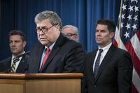 U.S. Attorney-General William Barr speaks during a news conference at the Department of Justice, in Washington, on Feb. 10, 2020.