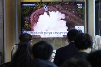 A TV screen shows a file image of North Korea's missile launch during a news program at the Seoul Railway Station in Seoul, South Korea, Wednesday, April 19, 2023. North Korean leader Kim Jong Un said his country has completed the development of its first military spy satellite and ordered officials to go ahead with its launch as planned, state media reported Wednesday. (AP Photo/Ahn Young-joon)