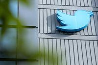 (FILES) In this file photo taken on October 28, 2022 the Twitter logo is seen on a sign on the exterior of Twitter headquarters in San Francisco, California. - Twitter owner Elon Musk on March 17, 2023 put out word that he will make public the long-secret algorithm for recommending tweets. The code used for recommending the posts suggested to users will become "open source" at the end of March, Musk said in a tweet of his own. (Photo by Constanza HEVIA / AFP) (Photo by CONSTANZA HEVIA/AFP via Getty Images)