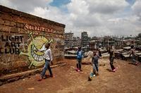 Children walk in the Mathare slum of Nairobi, Kenya, on April 22, 2020.