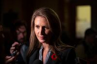 Ontario Transportation Minister Caroline Mulroney, scrums with the media in the Ontario legislature in Toronto, on Monday, October 28, 2019. Mulroney is defending delays in opening a midtown Toronto light rail transit line, saying Ottawa's LRT is an example of what happens when a transit system starts operating before it is ready. THE CANADIAN PRESS/Chris Young