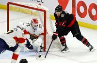 Ottawa Senators' Brady Tkachuk (7) tries to score on Florida Panthers goaltender Sergei Bobrovsky (72) as Panthers' Eetu Luostarinen (27) knocks away the puck during second period NHL hockey action at the Canadian Tire Centre in Ottawa on Saturday, March 26, 2022. THE CANADIAN PRESS/ Patrick Doyle