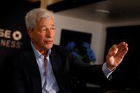 FILE PHOTO: Jamie Dimon, Chairman of the Board and Chief Executive Officer of JPMorgan Chase & Co., gestures as he speaks during an interview with Reuters in Miami, Florida, U.S., February 8, 2023. REUTERS/Marco Bello
