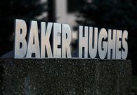 FILE PHOTO: FILE PHOTO: A Baker Hughes sign is displayed outside the oil logistics company's local office in Sherwood Park, near Edmonton, Alberta, Canada November 13, 2016. REUTERS/Chris Helgren/File Photo/File Photo