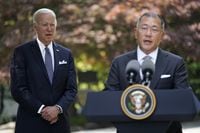 U.S. President Joe Biden, left, listens to Hyundai Motor Group Executive Chair Euisun Chung, at the Grand Hyatt Seoul, Sunday, May 22, 2022, in Seoul. (AP Photo/Evan Vucci)