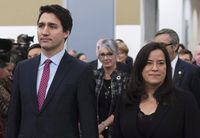 Prime Minister Justin Trudeau and Minister of Justice and Attorney General of Canada Jody Wilson-Raybould take part in the grand entrance as the final report of the Truth and Reconciliation commission is released in Ottawa on December 15, 2015.