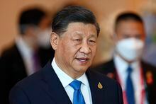 FILE - China's President Xi Jinping arrives to attend the APEC Economic Leaders Meeting during the Asia-Pacific Economic Cooperation, APEC summit, Nov. 19, 2022, in Bangkok, Thailand. Chinese leader Xi talked Wednesday, April 26, 2023, with Ukrainian President Volodymyr Zelenskyy by phone and appealed for negotiations in Russia's war against his country, warning “there is no winner in a nuclear war,” state media said, in a long-anticipated conversation after Beijing said it wanted to act as peace mediator. (Jack Taylor/Pool Photo via AP, File)