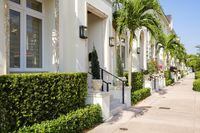   ROYALTY-FREE -- ISTOCKPHOTO.  Typical urban style town homes.Coral Gables, Florida USA - May 23, 2014: Newly completed beautiful luxury town homes located in the European inspired city of Coral Gables located in trendy Miami.
