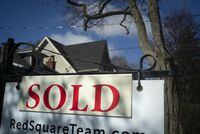 A real estate sold sign is shown in a Toronto west end neighbourhood May 16, 2020. The one-year anniversary of COVID-19 brought a doubling in March home sales to the Toronto region, where prices continued to soar as buyers kept rushing to take advantage of low mortgage rates. THE CANADIAN PRESS/Graeme Roy