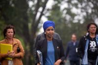 Rep. Ilhan Omar walks to a press conference at Boom Island Park in Minneapolis on Friday, Sept. 3, 2021. Minnesota Rep. Ilhan Omar and her progressive congressional allies urged President Joe Biden on Friday to stop construction on Enbridge Energy's Line 3 replacement, even as the project nears completion while opponents' options to stop it dwindle.(Evan Frost/Minnesota Public Radio via AP)