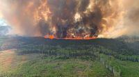 Hot and dry conditions are expected to continue as wildfires throughout western Canada have forced thousands of evacuations and air quality warnings due to smoke as far east as northern Ontario.The Bald Mountain Wildfire is shown in the Grande Prairie Forest Area on Friday May 12, 2023 this handout image provided by the Government of Alberta.  THE CANADIAN PRESS/HO-Government of Alberta Fire Service **MANDATORY CREDIT **